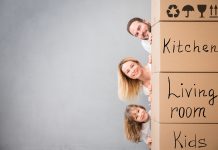 family-next-to-moving-boxes